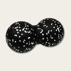 Balle de massage dos noire à éclats blancs