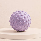 Balle de massage pieds sur socle, texture à picots pour détente musculaire