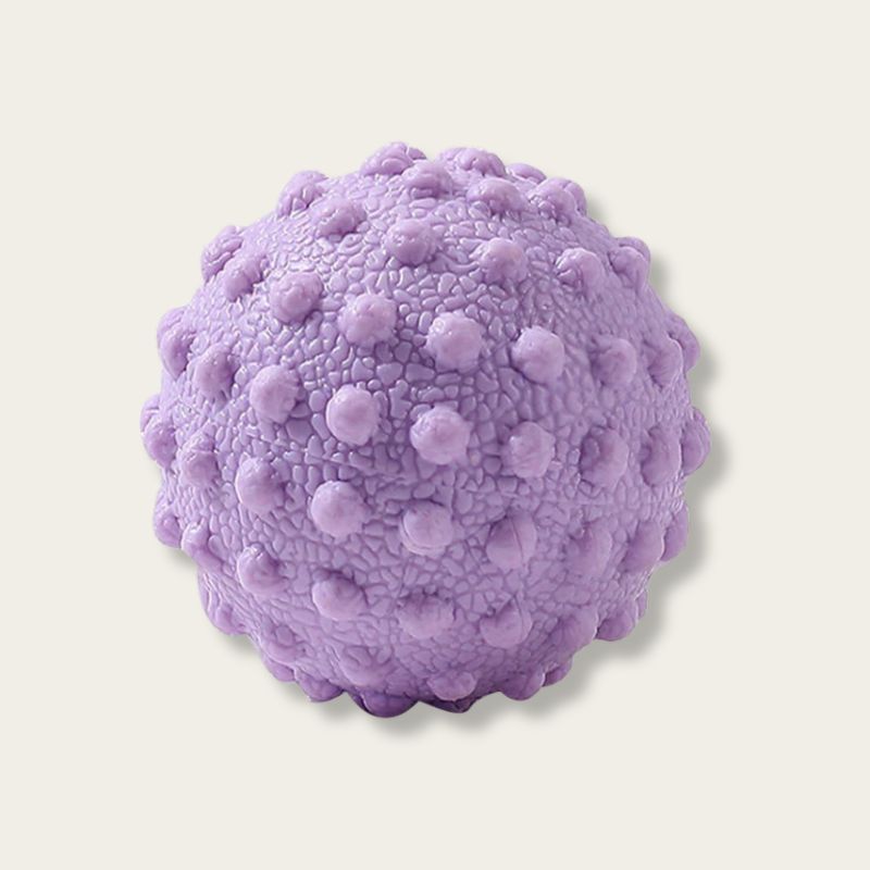 Balle de massage pieds violette vue de côté, design ergonomique 