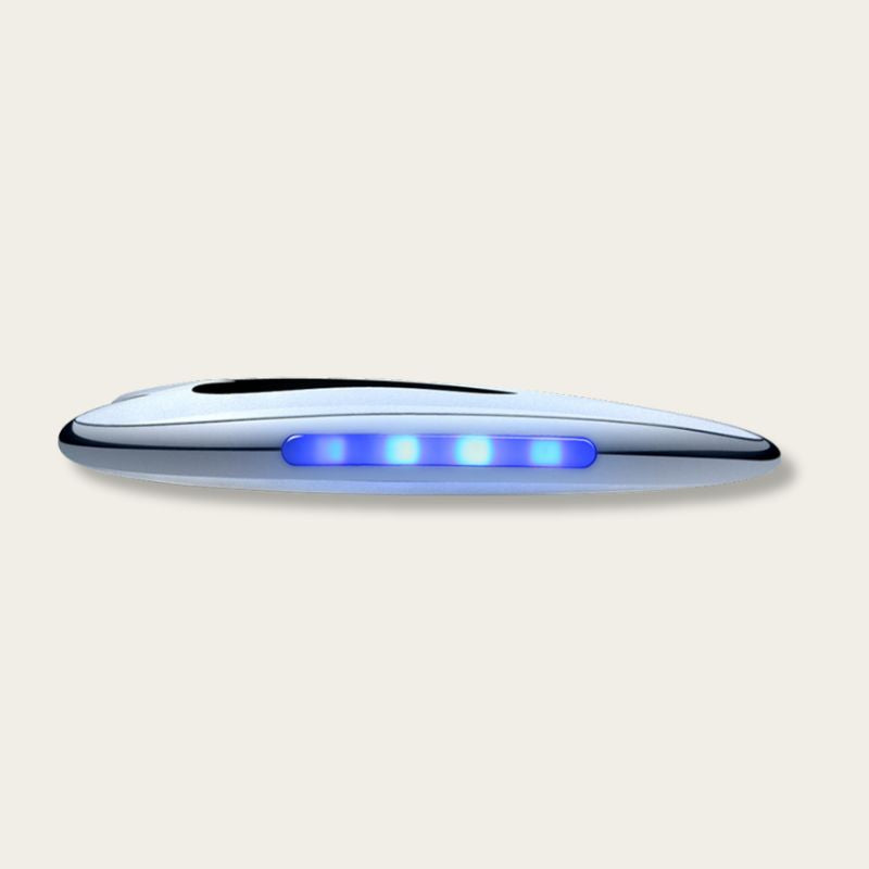 Gua Sha électrique affiché de profil avec éclairage LED bleu, design moderne