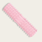 rouleau de massage dos rose avec surface texturée en 3D