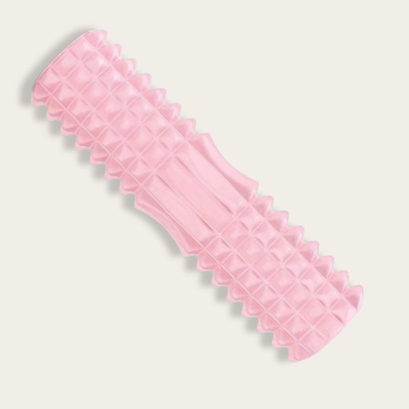 rouleau de massage dos rose avec surface texturée en 3D